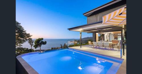 Airlie Beach House | 'Whitsunday Blue' Luxury Home with Ocean Views