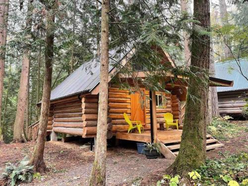 Regional District of Nanaimo House | Wind Down Log Cabin in the Woods with Cozy Woodstove
