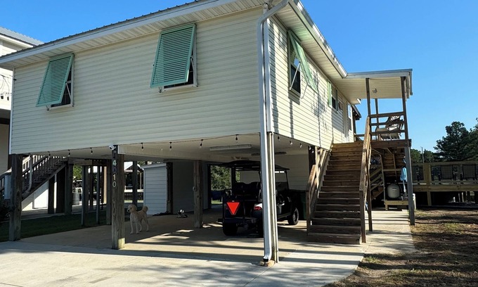 Shoreline Park House | Wine’d Down-Charming 2 BR/2BA on the water with a pool & dock in Bay St Louis