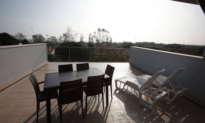 Rosolina Mare Apartment | Wonderful attic flat with sea view terrace