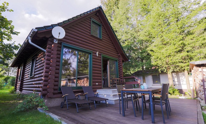 Templin House | Woodblockhouse on lakeland in between nature to relax with fireplace