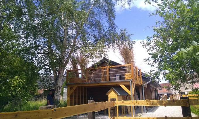 Hasnon Cottage | Wooden Chalet with Private Garden, Hot Tub, and Parking in Charming Village