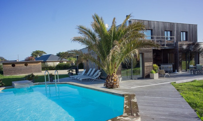Tregastel House | Wooden villa with private pool by the sea near Perros Guirec