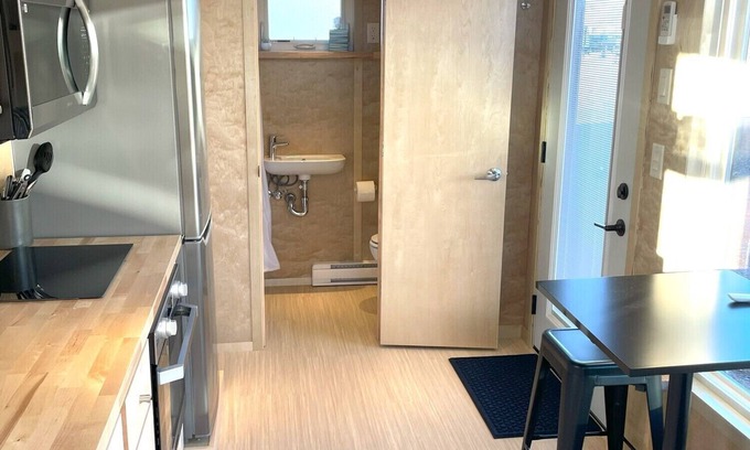Pear Park House | XL tiny home with two lofted queen beds and full size futon on the main level.