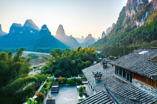 Yangshuo Hotel | Yangshuo Mountain River Ballad Hotel - Free Yangshuo Train Station Pick Up and Drop Off