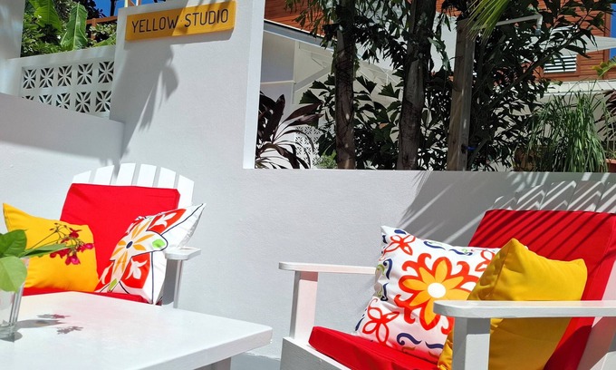 Caye Caulker Apartment | Yellow Studio - Amanda's Place - Pool and Tropical garden