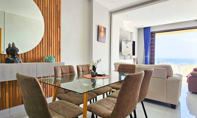 Flic-en-Flac Apartment | Zen Retreat with Stunning Sea Views and Sunsets, plus Common Pool and Gym Access