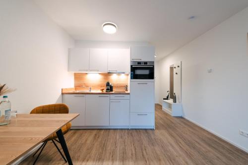 Metzingen Apartment | ZENtrahome - Balkon Outlet Zentral SmartTV Business