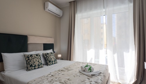 Deluxe Room, 1 Queen Bed, Balcony, City View