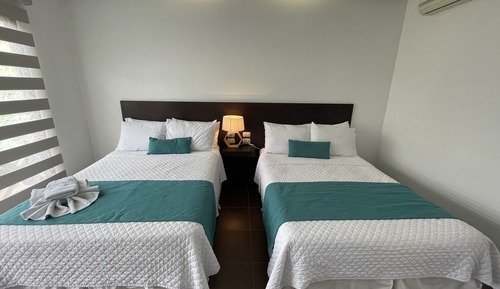 Superior Quadruple Room, 2 Double Beds, Refrigerator, Resort View