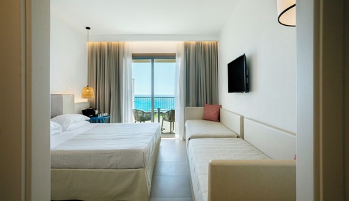 Deluxe Quadruple Room Sea View  (includes 1 free Spa access per person per stay)