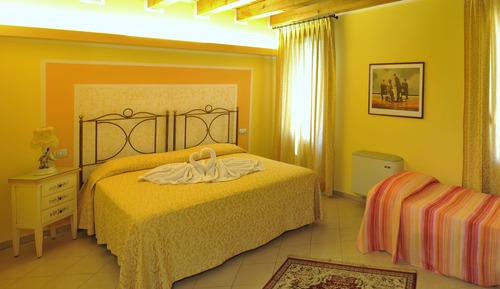 Triple Room (Matrimonial Bed plus Extra Bed)