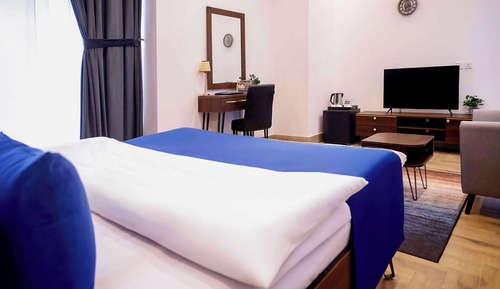 Deluxe Room, 1 King Bed, Smoking (Living Room)