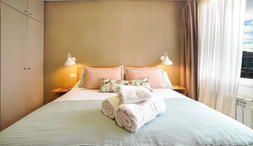 Mutisia con terraza y vista al lago (estacionamiento)