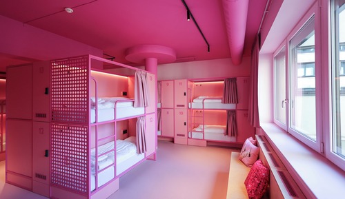 Single bed in female dormitory room