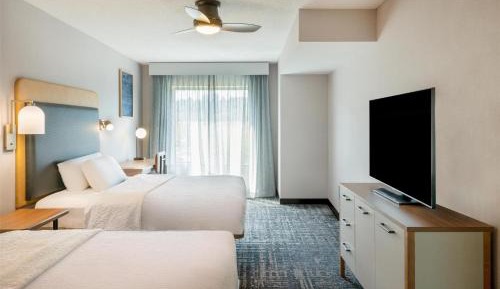 Two Bedroom Suite with One King and Two Queen Beds