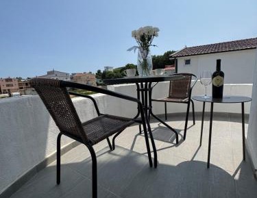 Two-Bedroom Apartment with Balcony and Terrace