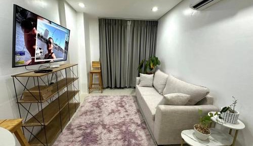 One-Bedroom Apartment with Balcony and City View