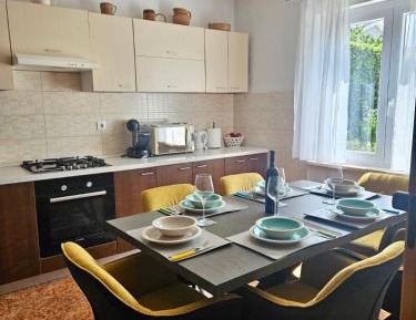 Four-Bedroom Apartment with Balcony 