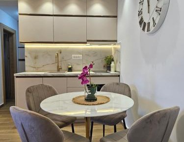 One-Bedroom Apartment with Balcony and Sea View