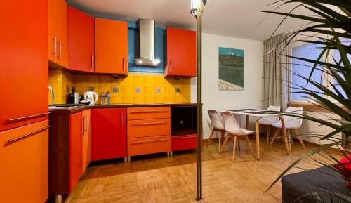 One-Bedroom Apartment with Balcony and City View