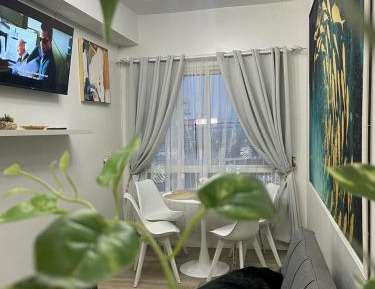 One-Bedroom Apartment with Balcony and City View