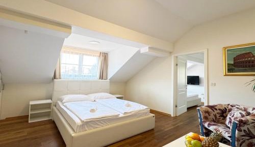 Four-Bedroom Apartment with Balcony 