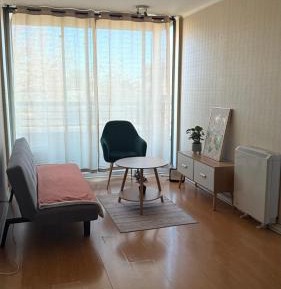 One-Bedroom Apartment with Balcony and City View