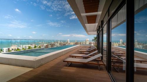 One-Bedroom Apartment with Balcony and Sea View