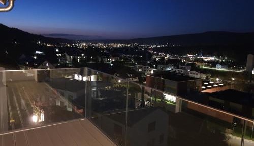 Four-Bedroom Apartment with Balcony 