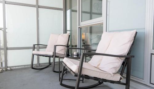 One-Bedroom Apartment with Balcony and City View