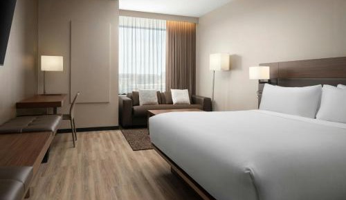 Deluxe King Room with Sofa Bed and City View