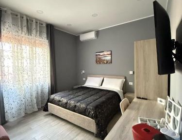 Quadruple Room with Private Bathroom