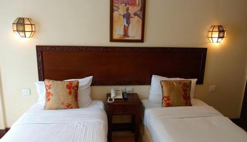 Standard Room 2  Single Bed,  21Sqm, Air Conditionned, Room Service, Tea And Coffee, Flat Screen Tv 