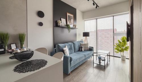 One-Bedroom Apartment with Balcony and City View