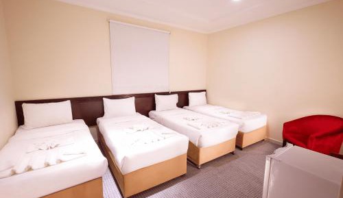 Quadruple Room with Private Bathroom