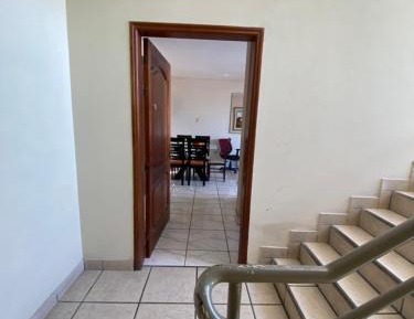 Four-Bedroom Apartment with Balcony 
