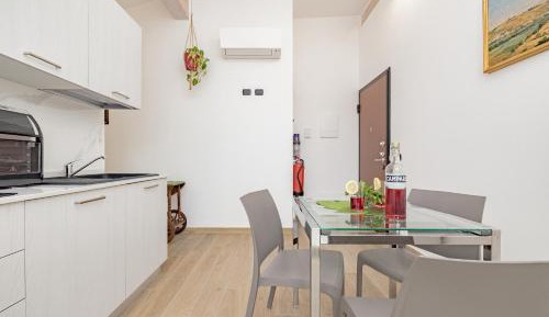 One-Bedroom Apartment with Balcony and City View