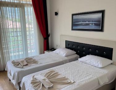 Double Room (1 Adult + 1 Child)