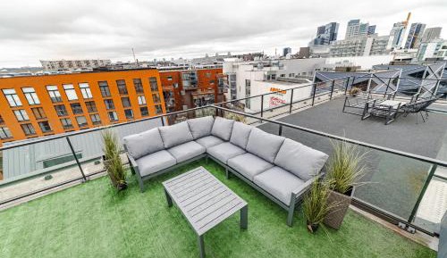 One-Bedroom Apartment with Balcony and City View