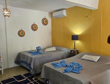 Quadruple Room with Private Bathroom