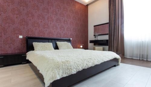 One-Bedroom Apartment with Balcony and City View