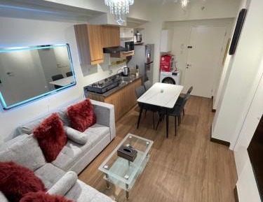 One-Bedroom Apartment with Balcony and City View