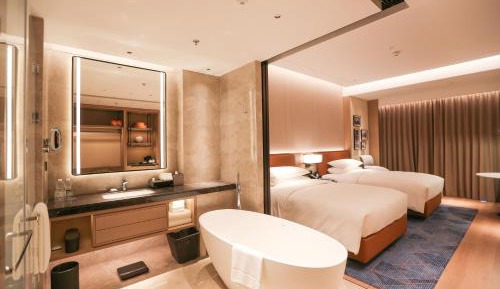 Deluxe Double Room with Two Double Beds, Balcony and City View