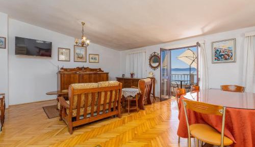 Three-Bedroom Apartment with Balcony and Sea View