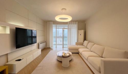 Four-Bedroom Apartment with Balcony 