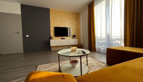One-Bedroom Apartment with Balcony and City View