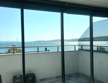 Three-Bedroom Apartment with Sea View