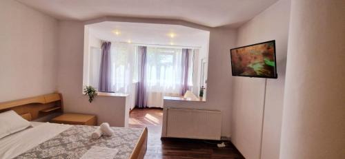 Quadruple Room with Shared Bathroom