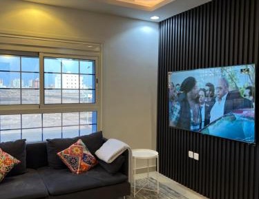 Three-Bedroom Apartment with Balcony